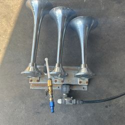 Train horns with solenoid