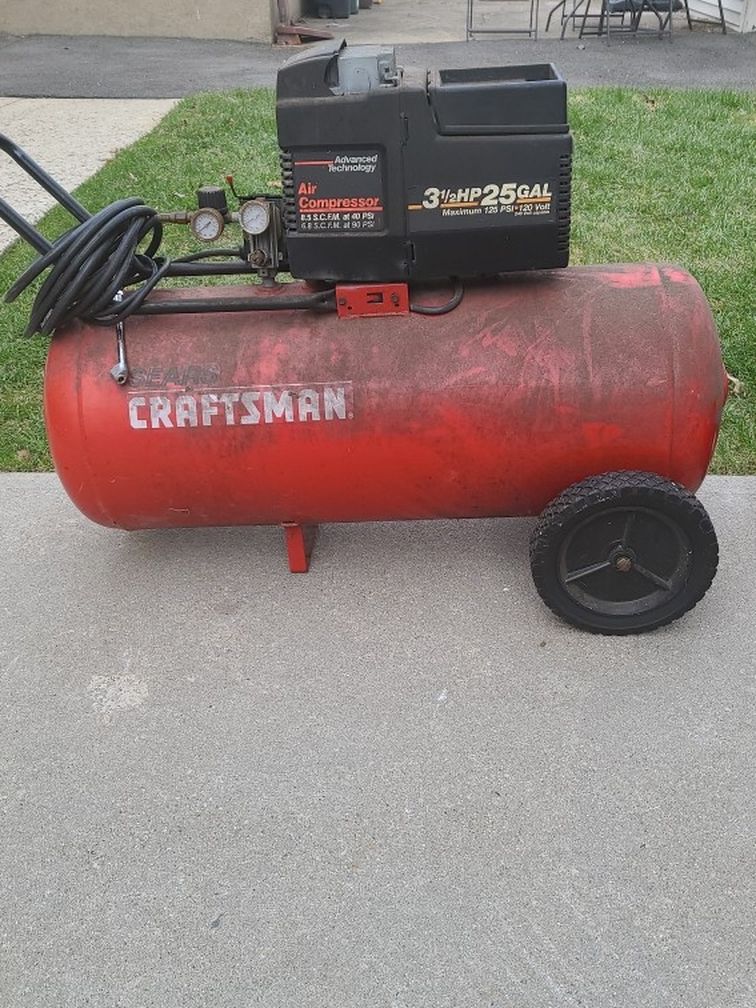 Air Compressor And Hose Reel With 200 Feet Of Hose $200 Firm On Price