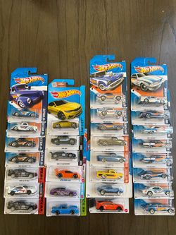 Hot Wheels HW Racing Lot of 29 cars plus freebies