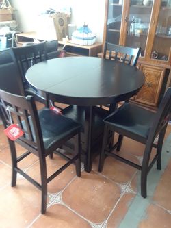 New counter height dining table with four chairs