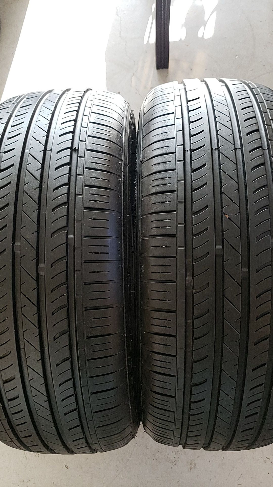 Land sport in good condition 2 tires 215 55 17 80% tread