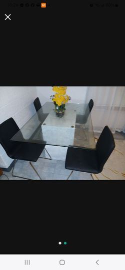 Glass Top Table And Four Cheir.