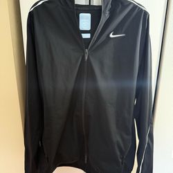 The Nike x NOCTA Black Nylon Hooded Running Jacket DV3661-010 in size S