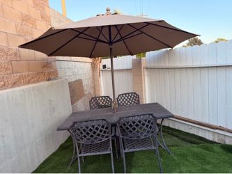 Metal patio set with umbrella