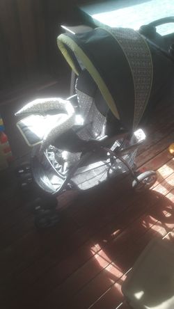 Baby trend stroller with basket and infant attachment and collapsible