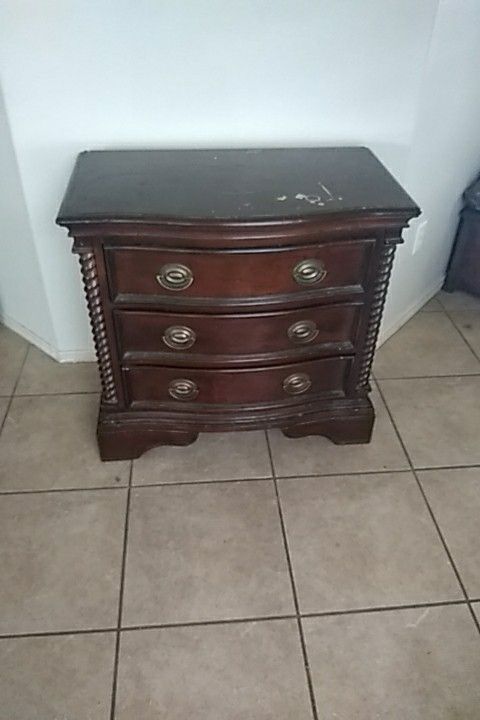 Bedroom set. Dresser with mirror, 2 big night stands, and head board/footboard/frame for king size bed. Solid oak..