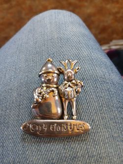 A Christmas pin.