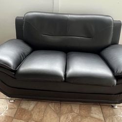 Set Black Love Seat And Sofa. Price Including Delivery 