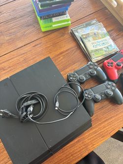 Sony PlayStation 4 Console with Controllers and Cables
