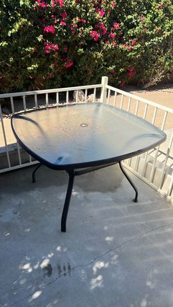 Glass top patio table