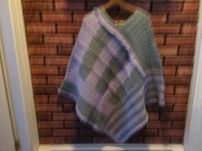 New, one of a kind, ladies or teenagers poncho