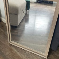 Tan wood accent mirror