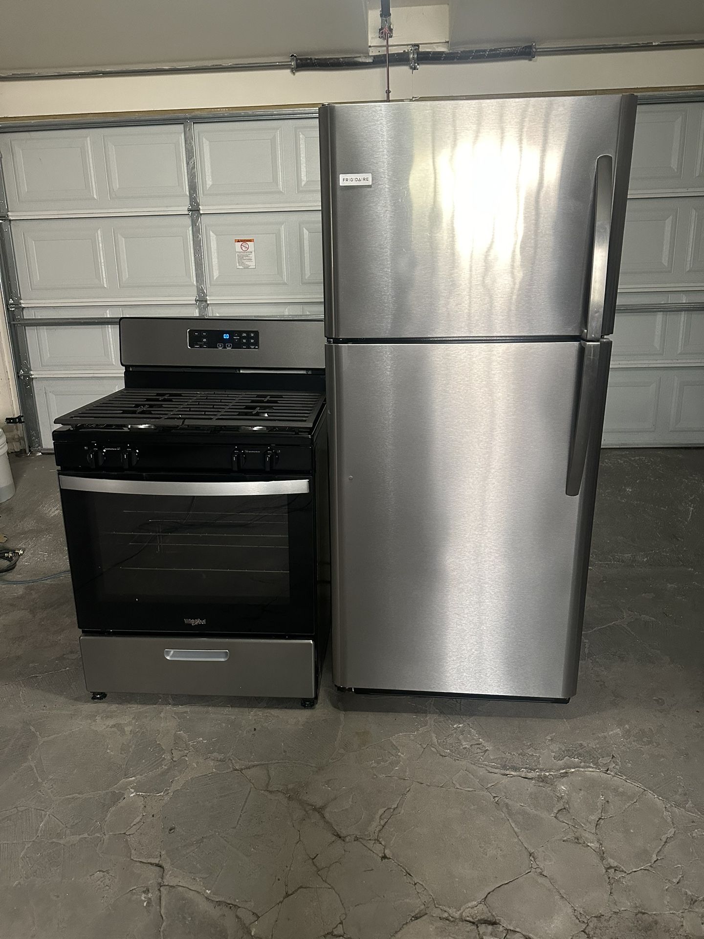 Frigidaire top freezer refrigerator & Whirlpool gas stove set for Sale