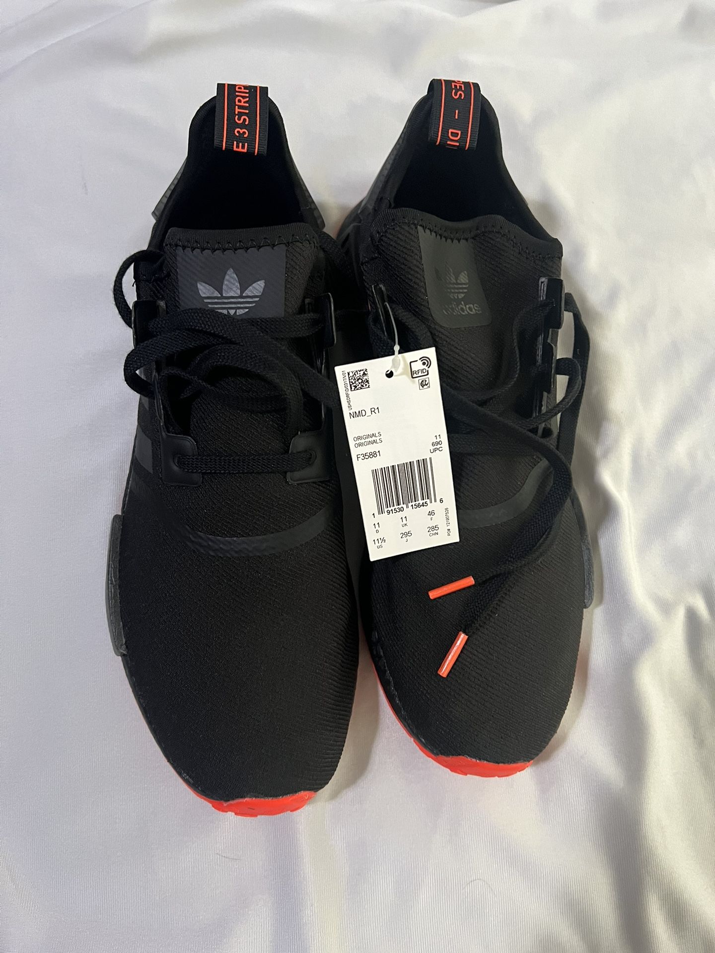 Adidas NMD R1 Core Black Solar Red Sole