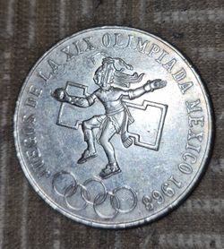 This is a 1968 Mexico 25 Pesos silver coin