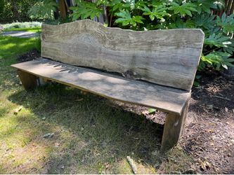 Outdoor wood bench with raw live edge