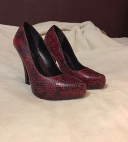 Call it spring Snake print heels
