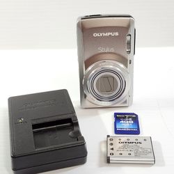 Olympus Stylus 7040 14MP Digital Camera 7x Zoom With 4GB SD Card - TESTED 