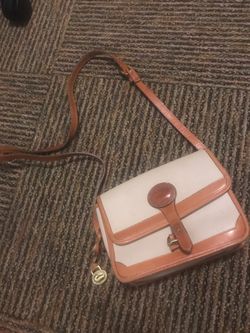 100% authentic Dooney & Bourke