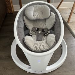 Munchkin Baby swing With remote 