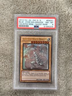 2012 YU-GI-OH! GOLD SERIES: HAUNTED MINE #EN001 BLUE-EYES WHITE DRGN. HAUNTED MINE-GHOST RARE PSA 8