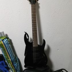 ELECTRIC GUITAR IN GOOD SHAPE 