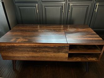 Pop up coffee table $75