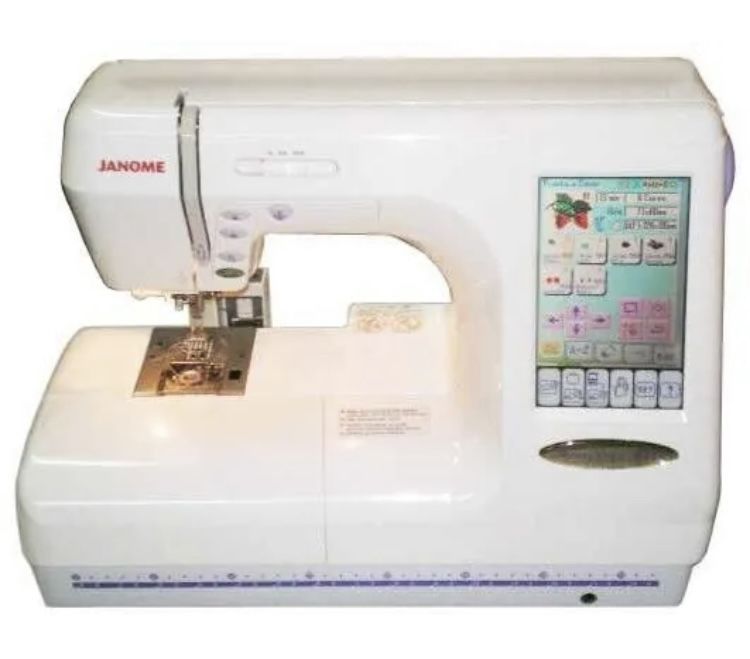 Janome Memory Craft MC10001 Sewing/Embroidery Machine W/Extras