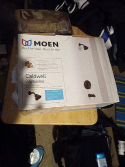 Moen Bronze Shower Head And Bath Handle 