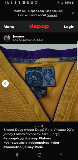 Snoop Dogg Lakers colored jersey.