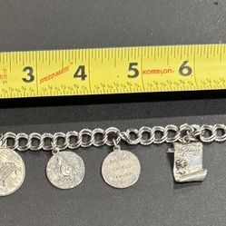 Choir/Piano/Graduation Bracelet. Vintage 1962. Charms show wear as shown. Personalized. One charm marked Sterling. 