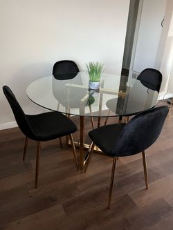 Chic Glass Dining Table with Velvet Accent Chairs