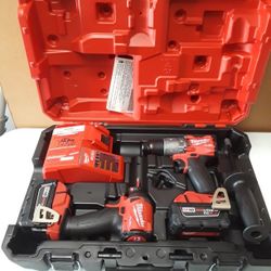 Milwaukee Fuel 18 Volt Drill And Impact Kit Including Two Batteries Charger And Case. New