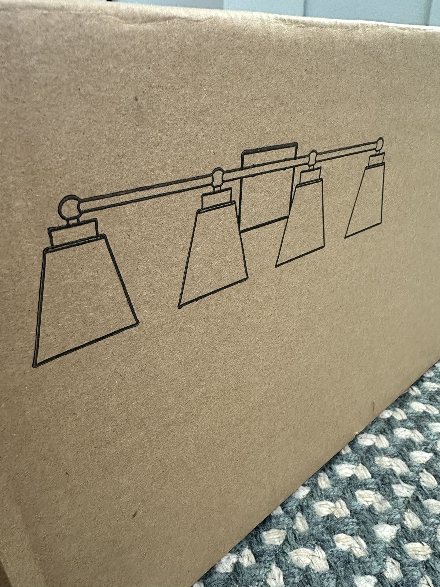 Four-light vanity fixture