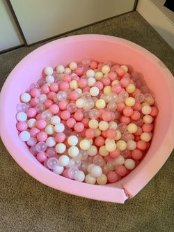 Pink Foam Ball Pit with lots of balls