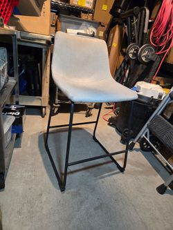 light gray upholstered stool (x2)