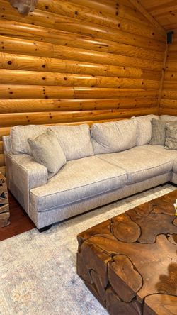 6 piece Ashley sectional. Very cozy and and comfortable sectional. Like  new!!
