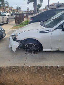 White Sedan – Subaru BRZ - Axel Collision Damage