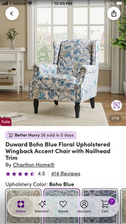 Floral upholstered wingback accent chair with nailhead trim