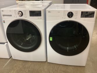 LG Smart 4.5 cu.ft. Front Load Washer and 7.4 cu.ft. Electric Dryer Set New Scratch and Dent