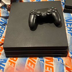 PS4 PRO 1TB WITH CONTROLLER AND WIRES!