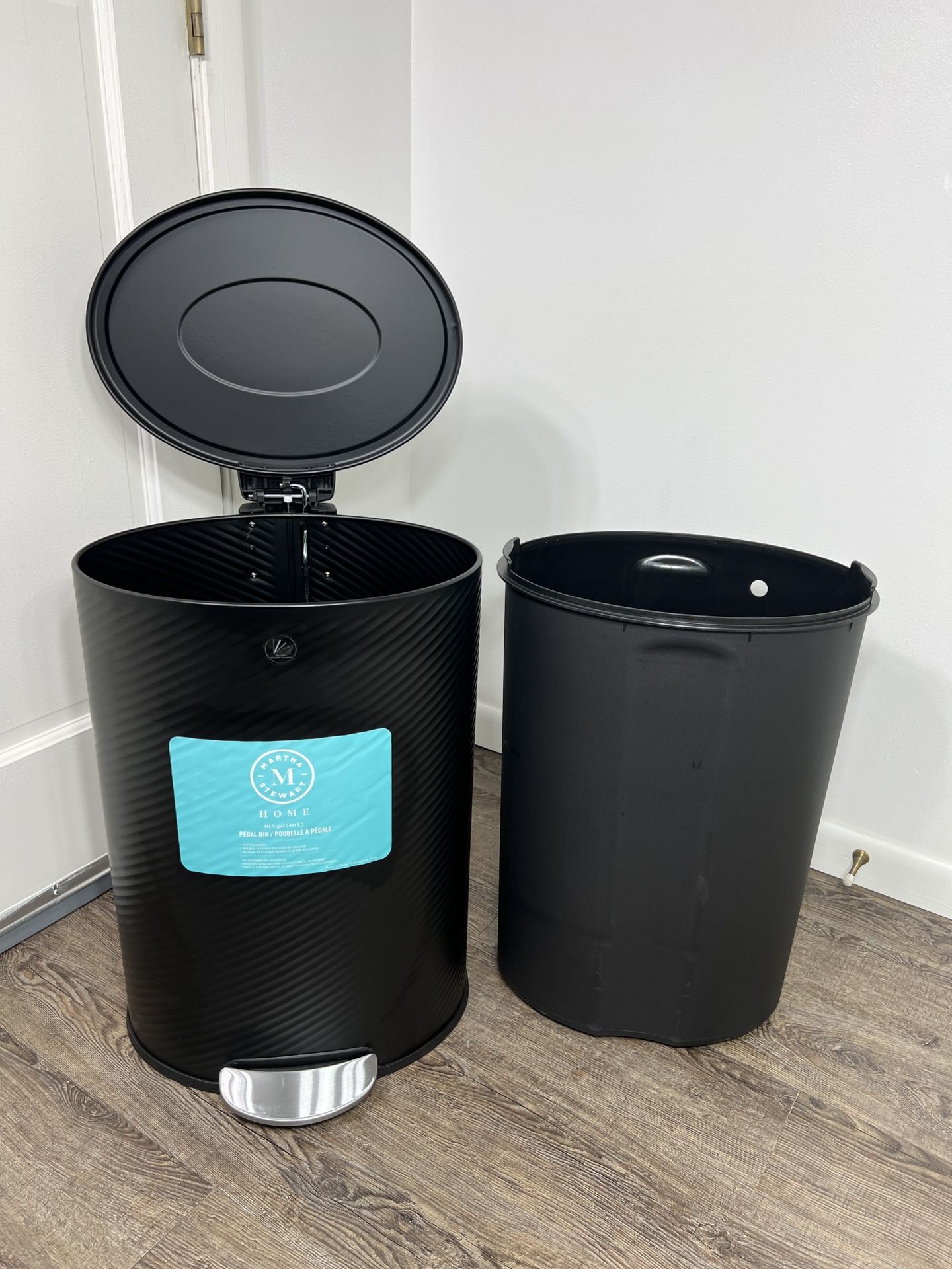 Martha Stewart Home kitchen trashcan pedal bin 10.5-gallon (40-liter) in a black finish, with a textured/ribbed body design