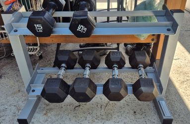 Dumbells, 25, 20, 15 and rack.