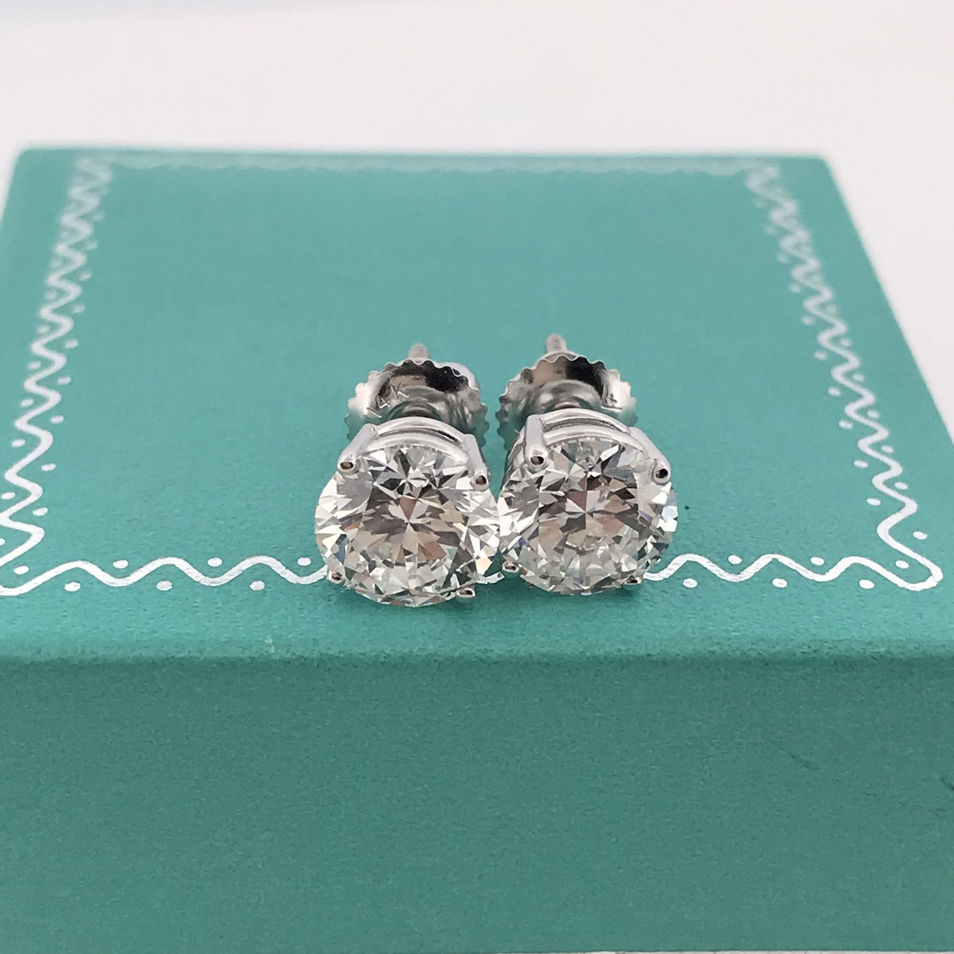 14k white gold screw backs  3.02ct total Lab Grown 