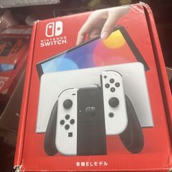 Nintendo Switch - OLED Model with White Joy-Con