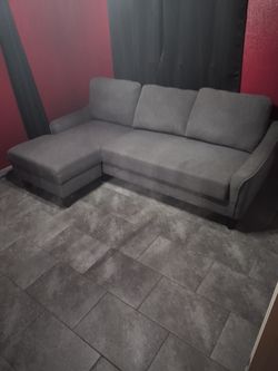 Like New Gray Sleeper Chaise Sectional with Pull-Out Bed