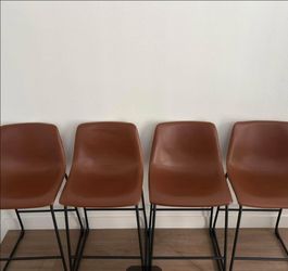 Set of 4 Counter-Height Bar Stools | $150