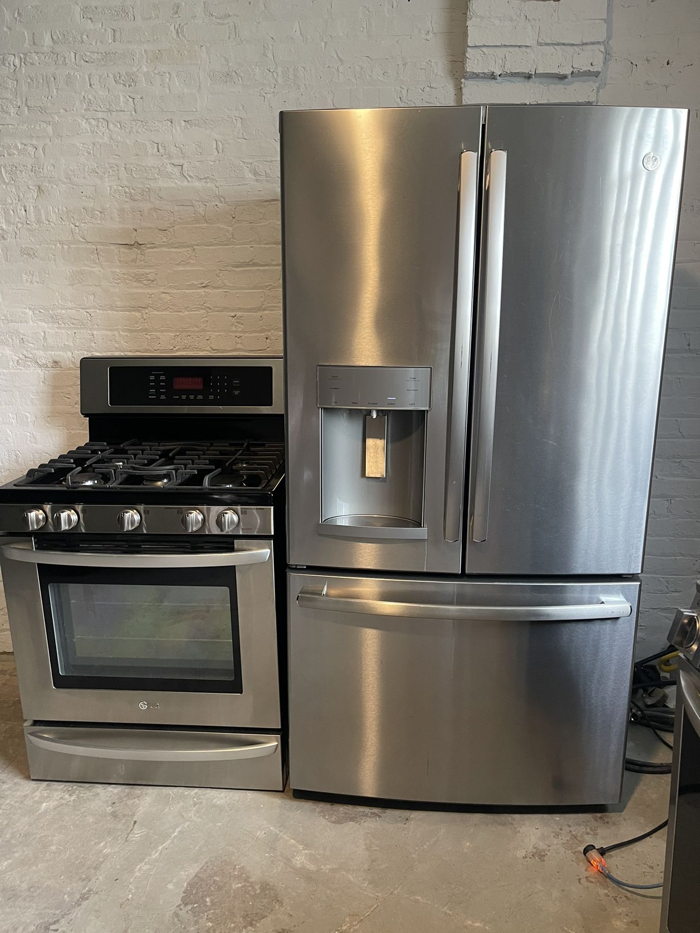 GE counter depth french door refrigerator & LG gas range combo 