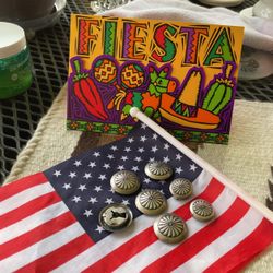 Seven silver button covers