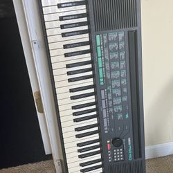 Old Keyboard Piano With No Cord 